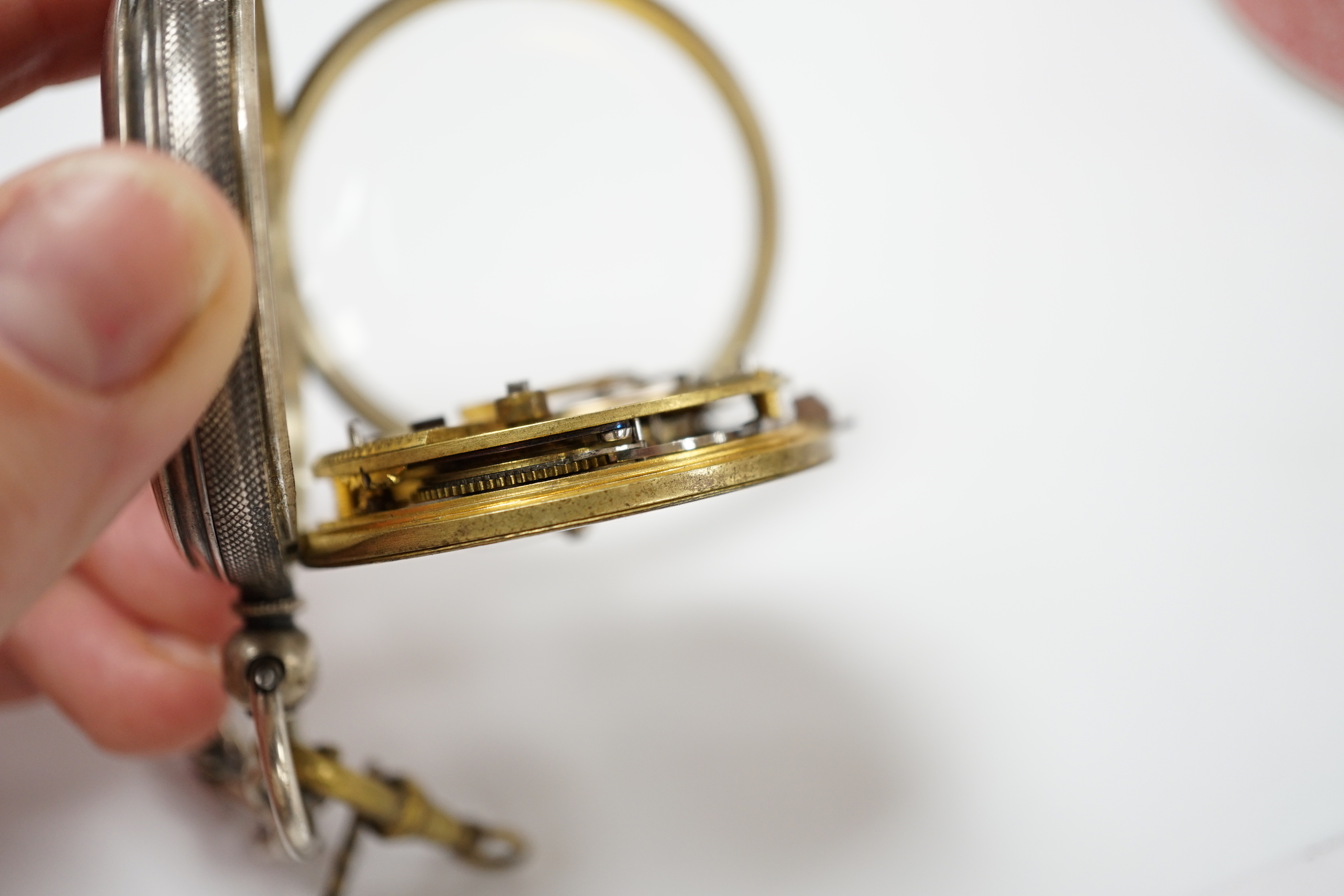 A 1920's silver open face pocket watch and a gold plated hunter pocket watch.